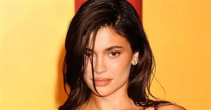Kylie Jenner Lounges In A Strapless, Floral Bikini A Week Into Fall — See Pic